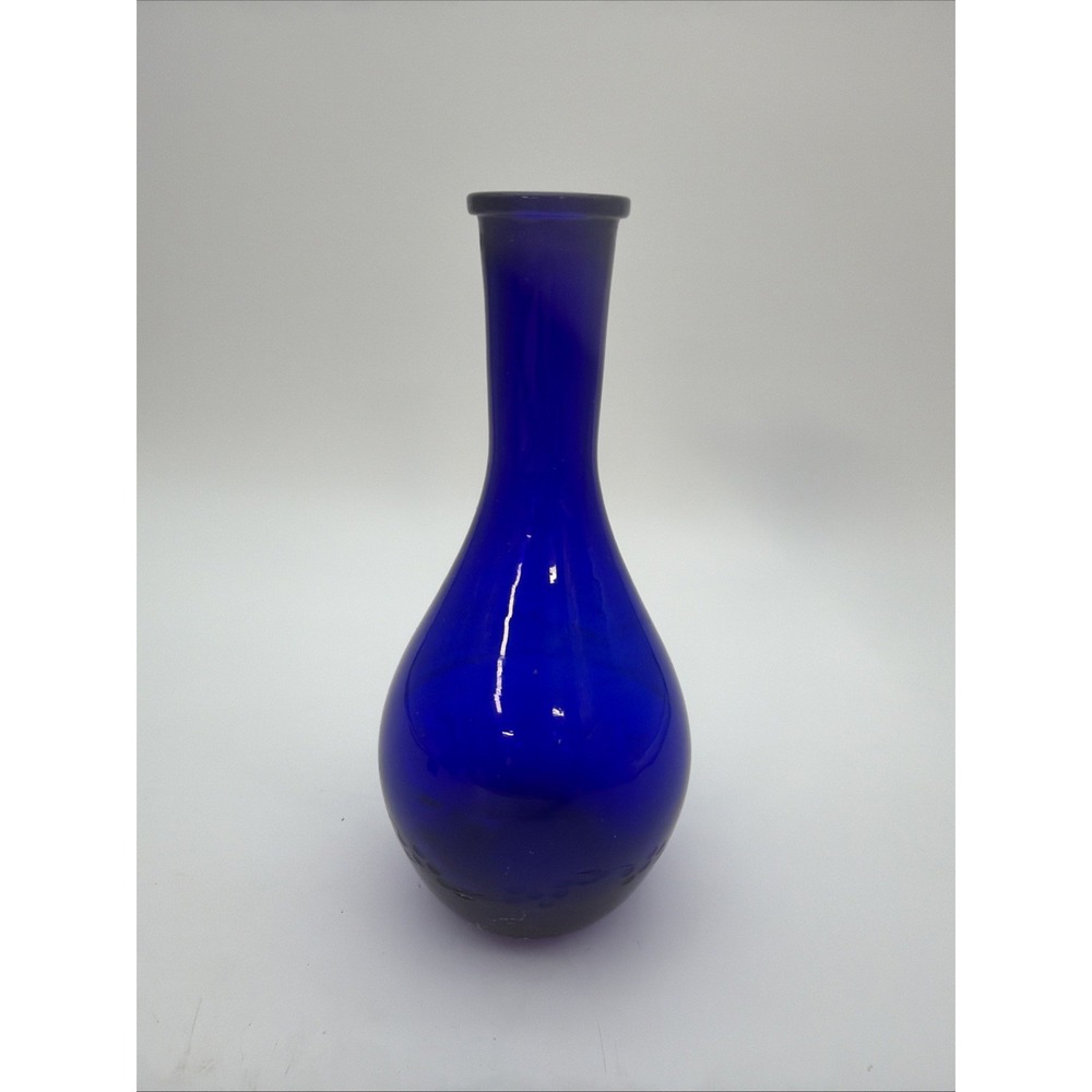 vibrant cobalt blue glass vase with a pear-shaped body
